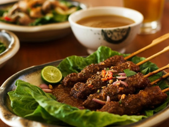 Authentic Indonesian dishes like nasi goreng, gado gado, and satay served in Amsterdam Authentic Indonesian dishes like nasi goreng, gado gado, and satay served in Amsterdam