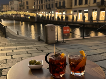 Evening crowds in Navigli enjoying aperitivo by the canal