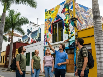 Colorful murals covering buildings in Quinta do Mocho, showcasing street art Colorful murals covering buildings in Quinta do Mocho, showcasing street art