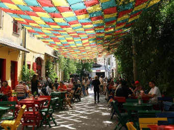 Colorful street art and local street food vendors in the multicultural Mouraria Colorful street art and local street food vendors in the multicultural Mouraria