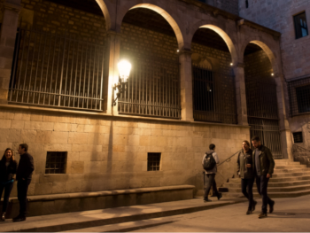 Plaça del Rei in Barcelona's Gothic Quarter and people exploring the area Plaça del Rei in Barcelona's Gothic Quarter and people exploring the area