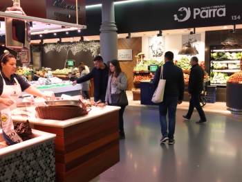 Mercat de Sant Antoni late night indoor market with stalls selling all sorts of different food Mercat de Sant Antoni late night indoor market with stalls selling all sorts of different food