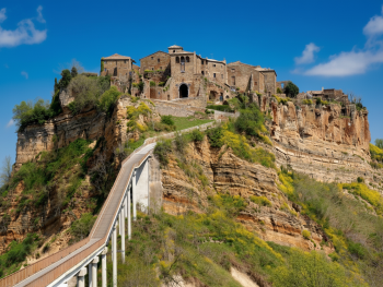Footbridge to Civita di Bagnoregio over deep gorge Footbridge to Civita di Bagnoregio over deep gorge