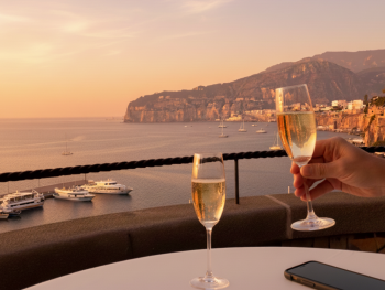 The terrace at Terrazza Bosquet overlooking Sorrento and the bay at sunset