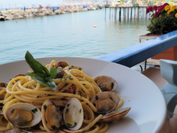 Spaghetti alle vongole at Marina Grande waterfront Spaghetti alle vongole at Marina Grande waterfront