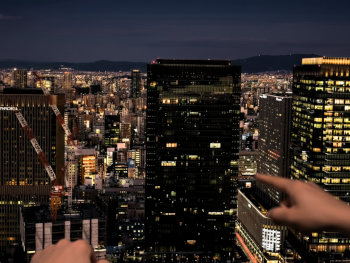City lights spreading to the horizon from the Kuchu Teien Observatory rooftop City lights spreading to the horizon from the Kuchu Teien Observatory rooftop