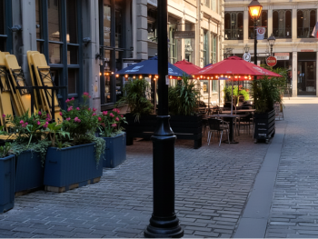 Rue Saint-Paul café terraces on quiet cobblestones Rue Saint-Paul café terraces on quiet cobblestones