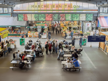 Morning rush at Jean-Talon Market produce stalls Morning rush at Jean-Talon Market produce stalls