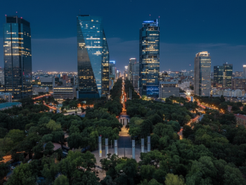 Mexico City skyline at dusk from elevated viewpoint Mexico City skyline at dusk from elevated viewpoint