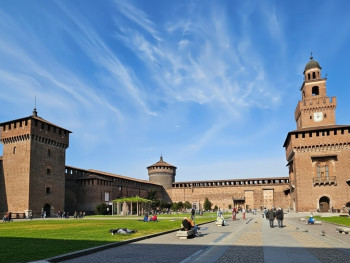 Castello Sforzesco’s inner courtyard with historic architecture and quiet charm Castello Sforzesco’s inner courtyard with historic architecture and quiet charm