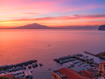 Sunset over Sorrento bay with Mount Vesuvius in silhouette Sunset over Sorrento bay with Mount Vesuvius in silhouette