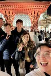 Selfie of a group at the Tsuzumi Gate, Japan.