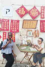 Exploring vibrant street art on a hidden corner in Singapore.