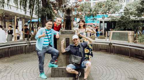 People gathered around the Hachiko statue at Shibuya Station, Tokyo.