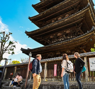 Tourists on a tour in Kyoto, Japan