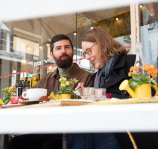 Tourists enjoying a cup of coffee at a local Coffee sho