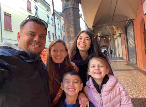 Family Smiles Under Italy’s Archways