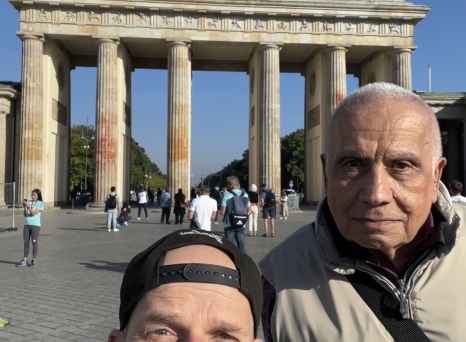 Sharing a smile where history stands tall