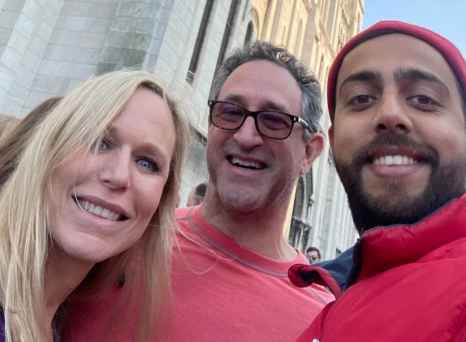 Sharing Smiles Beneath Iconic French Architecture