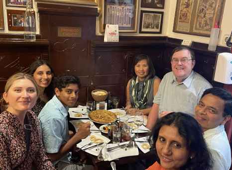 Family Gathering Around Traditional Flavors