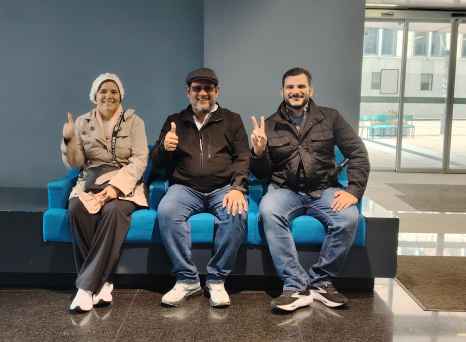 Peace and Thumbs Up: Moments of Joy at the Entrance