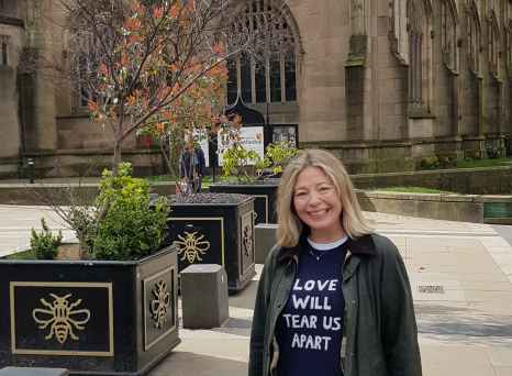 A Joyful Moment in Front of Gothic Majesty