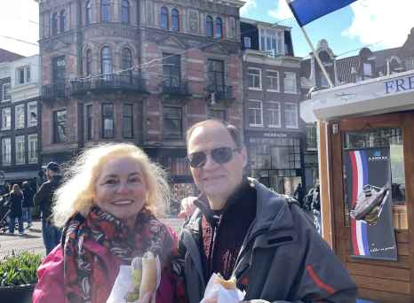 View of a man and woman by Hefferich building, Amsterdam.