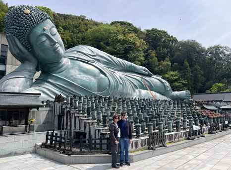 Large bronze sculpture of a reclining Buddha at Nanzo-in Temple, Sasaguri, Japan.