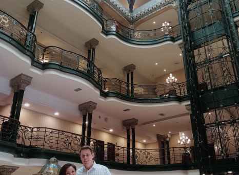 Interior view of Gran Hotel Ciudad de Mexico, showing ornate balconies and stained glass ceiling.