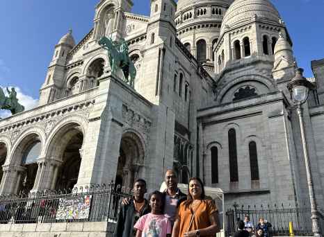 Group of people in front of Sacré-Cœur Basilica, Paris.