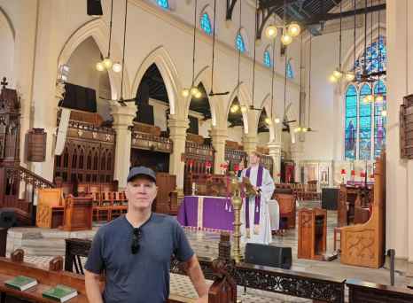 St. Andrew's Cathedral (Hong Kong) interior with gothic arches and stained glass windows.