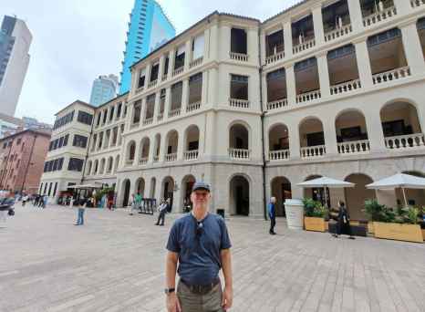 Person standing in front of Tai Kwun, Hong Kong.