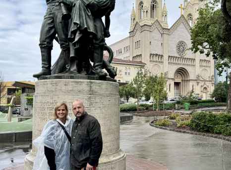 Enjoying a rainy day by a historic San Francisco statue.