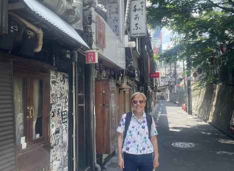 Strolling through Tokyo's narrow lanes under a lazy afternoon sun.