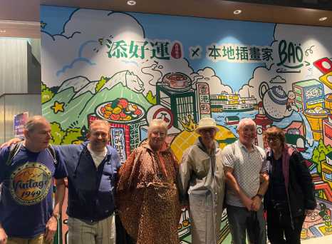 Street Art Smiles – Group Shot by the Colorful Bao Mural