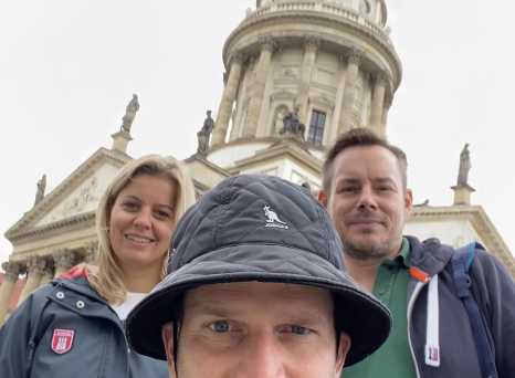 Gendarmenmarkt Greetings: A Trio Immersed in Architecture