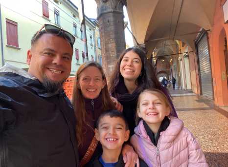 Family Smiles Under Italy’s Archways