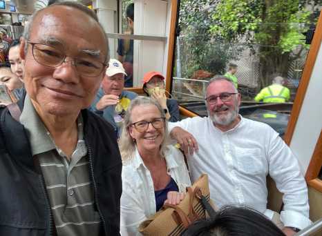 Catching smiles and stories as the city glides by 