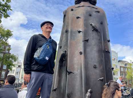 Standing Tall: A Moment with the Bronze Guardian