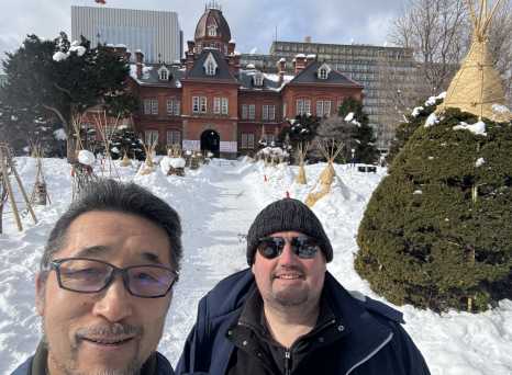 Snowy Smiles at the Red Brick Mansion