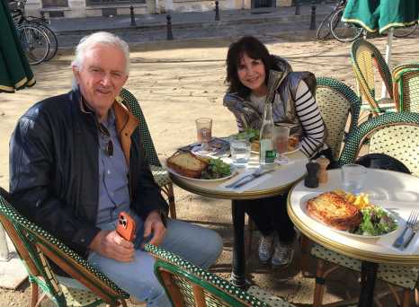 Sunlit Café: Sharing Moments Over Lunch