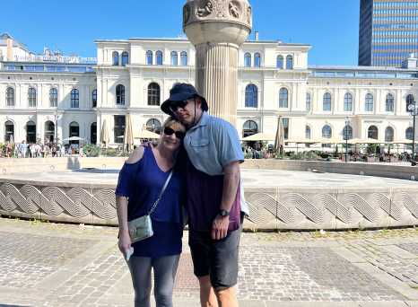 Embraced by Summer: A Charming Moment in the City Square
