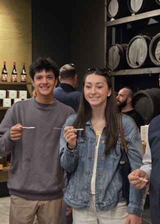 Amid wines and smiles, savoring a taste of Bologna's charm.