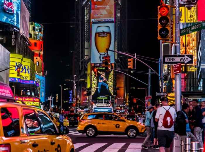 Stand and admire Times Square