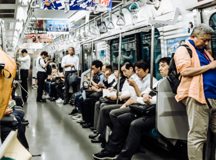 Travelers sitting on a train