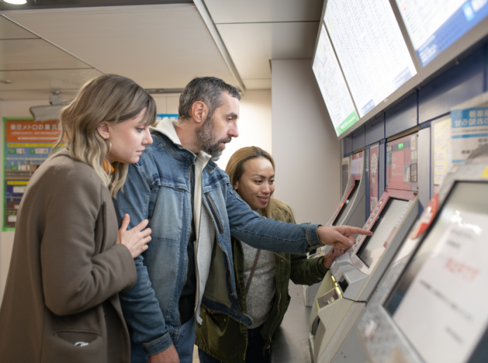 local guide and tourists planning their route