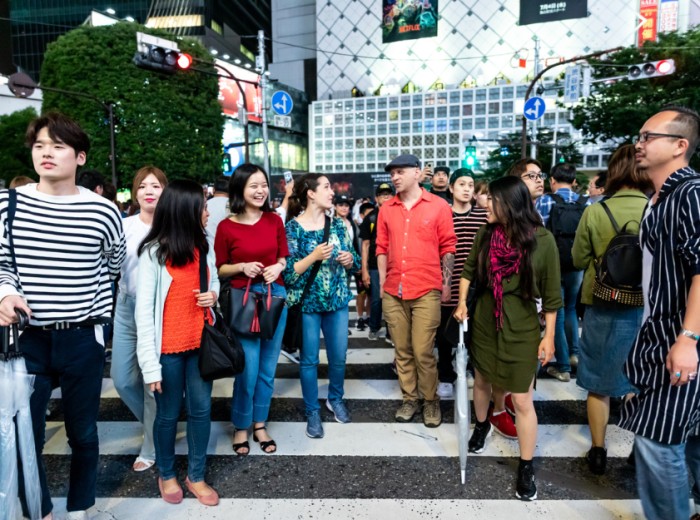 People crossing the busy Shibuya Crossing