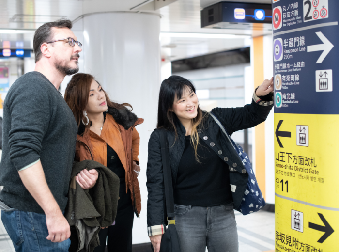 Tourists embarking on tours in Tokyo, Japan