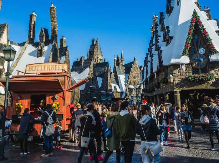 Butterbeer stand with crowd. photo by Sittipong Phokawattana Shutterstock