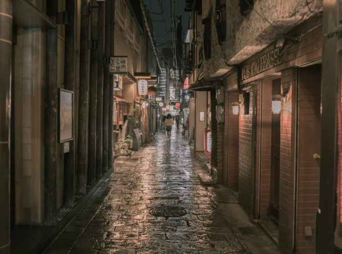 Narrow street with pastel-painted houses